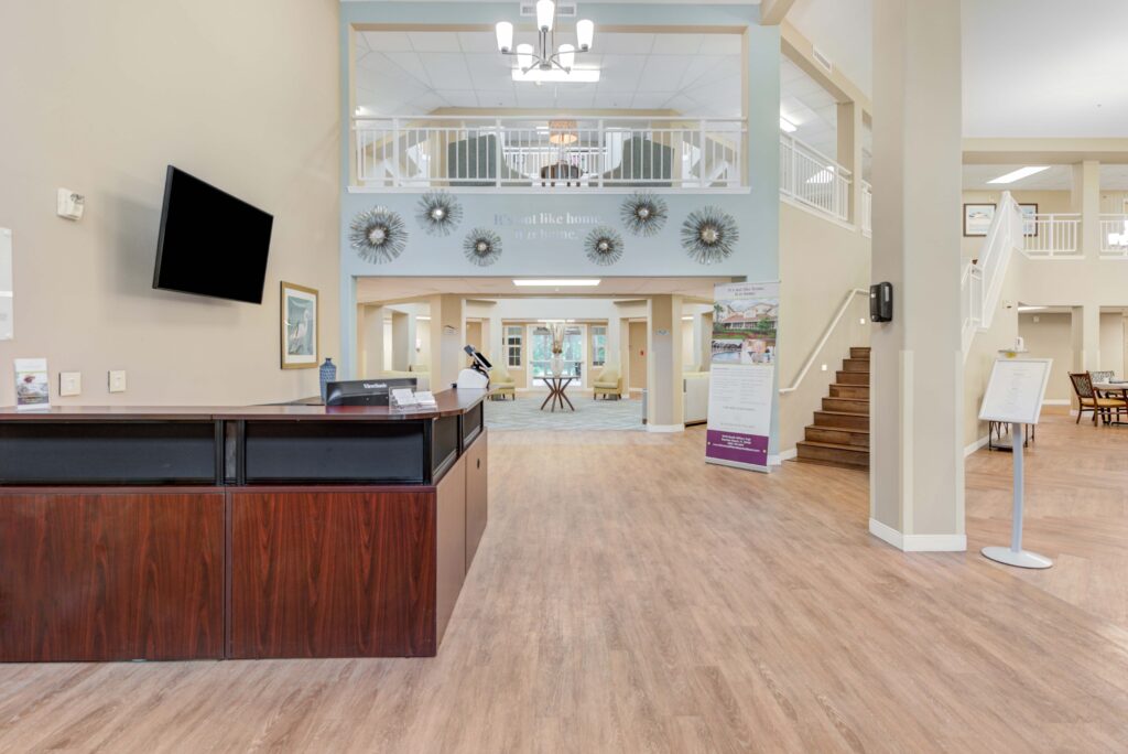 8440-South-Military-Trail-Boynton-Beach-FL-33436-USA_20220810_001_Edits-Copy-1 - Windward Palms Interior shot of Windward Palms lobby entrance at Windward Palms, a premier senior living community near Boynton Beach.