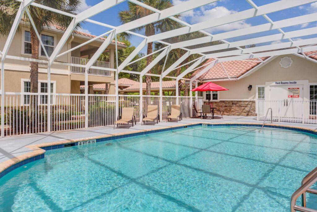 8440-South-Military-Trail-Boynton-Beach-FL-33436-USA_20220810_065 - Windward Palms Exterior shot of Windward Palms outdoor pool area at Windward Palms, a top choice for senior living in Delray Beach.