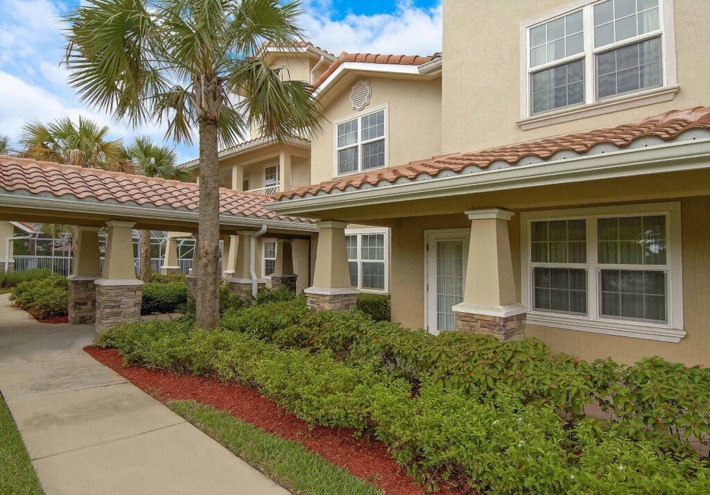 Exterior shot of Windward Palms front entrance.